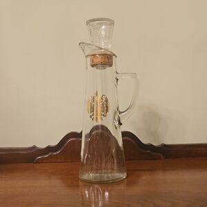 Vintage Owens-Illinois glass liquor decanter with a Romanov crest. 